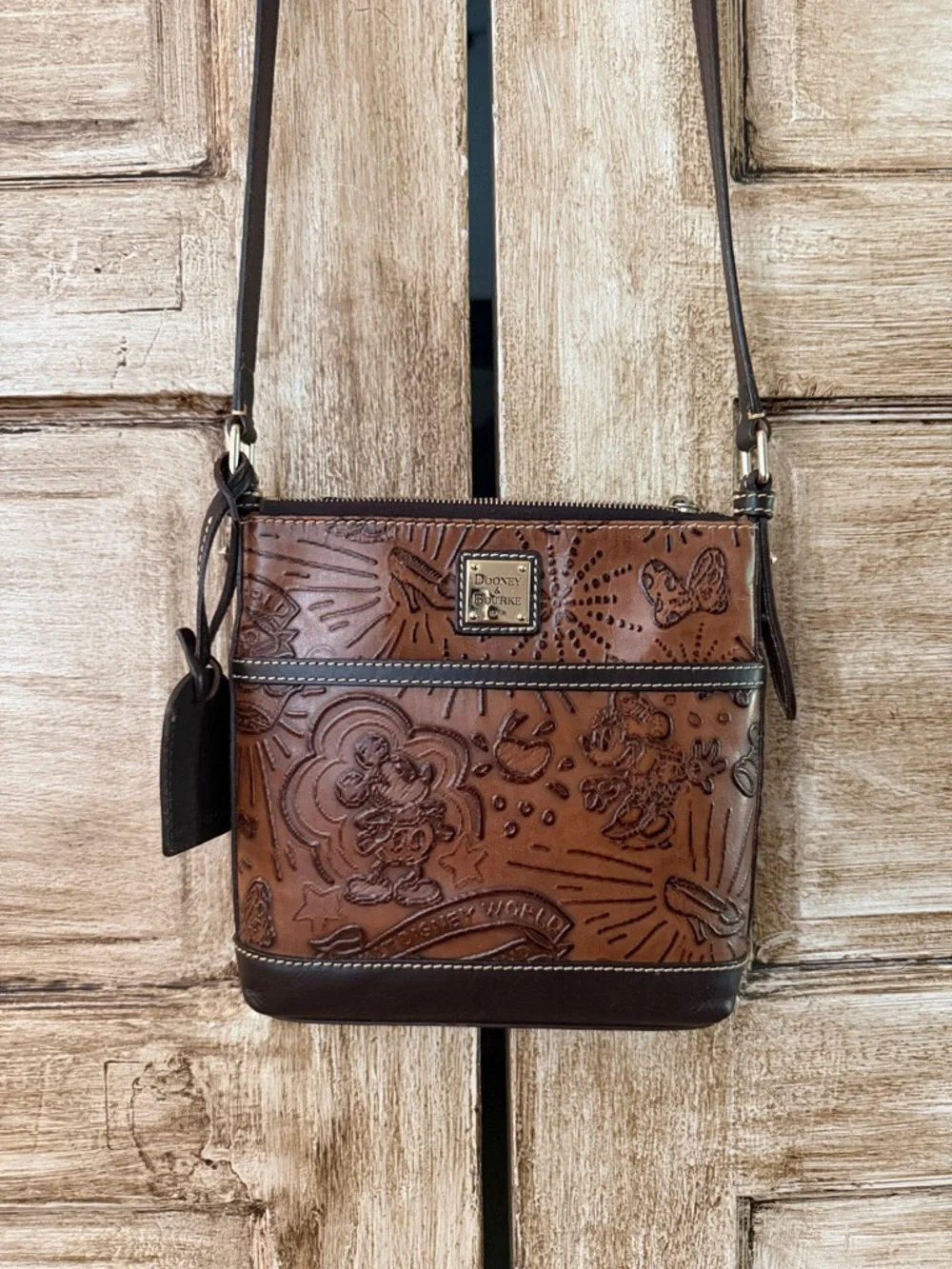 Dooney & Bourke Disney world parks Brown Embossed Leather Crossbody/Dark Trim - Picture 1 of 16